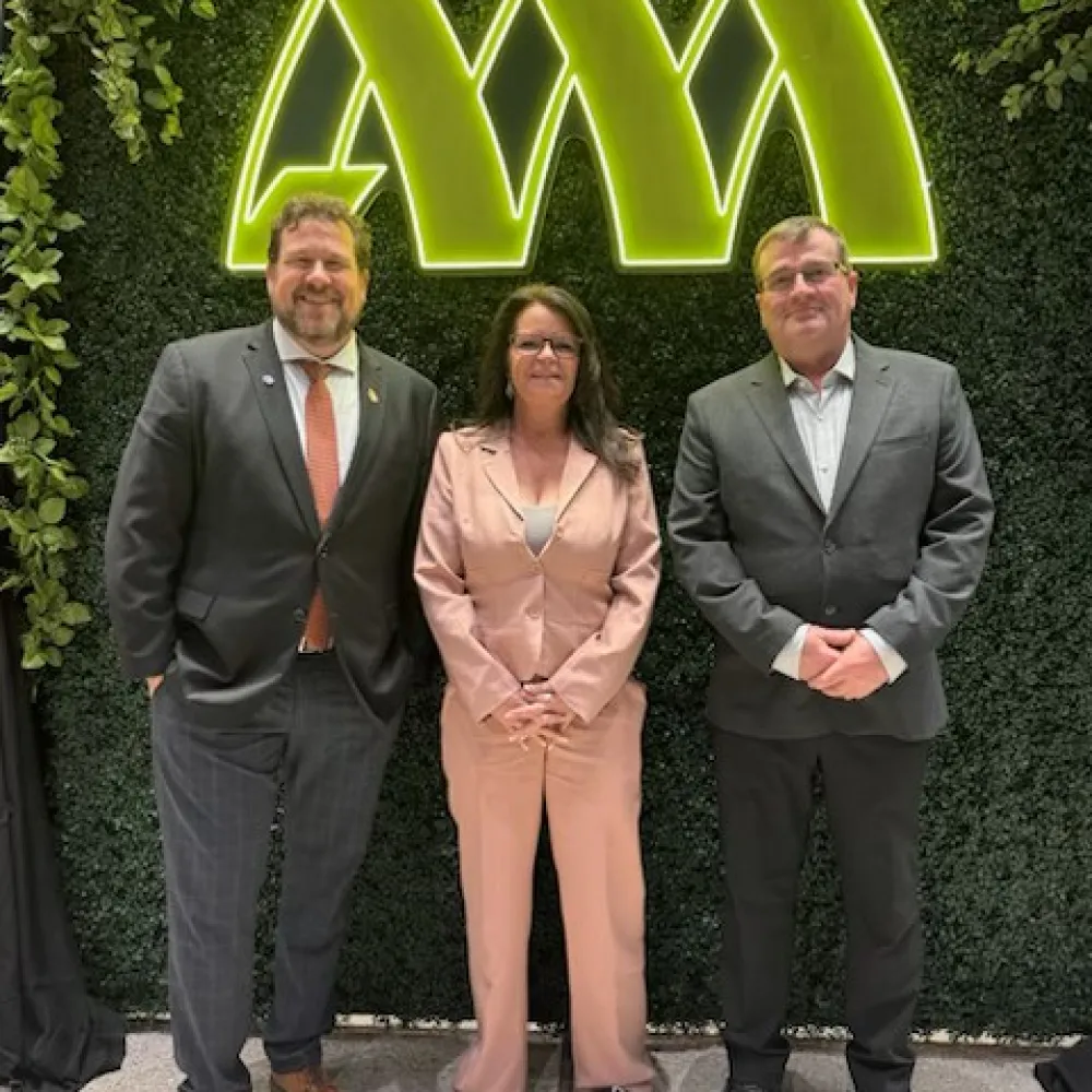 Honorable Minister Glen Simard together with NACC President, Sheryl Matheson and Vice President and Eastern Chair, Eric Olson